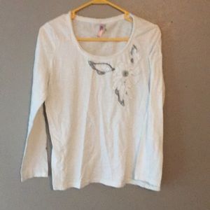 White long sleeve shirt with the flower
